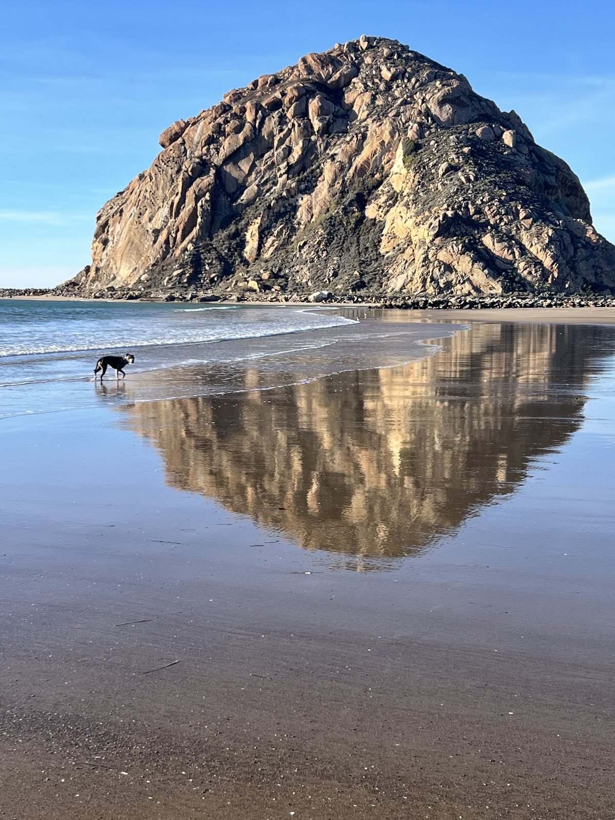 Morro Rock reflection on the beach